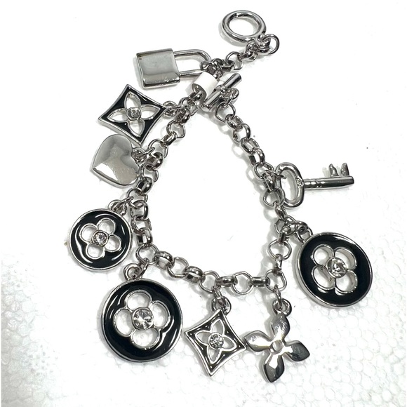 NWT SILVER KEY LOCK 🔐 HEART 💙 FLORAL BRACELET - Picture 1 of 3